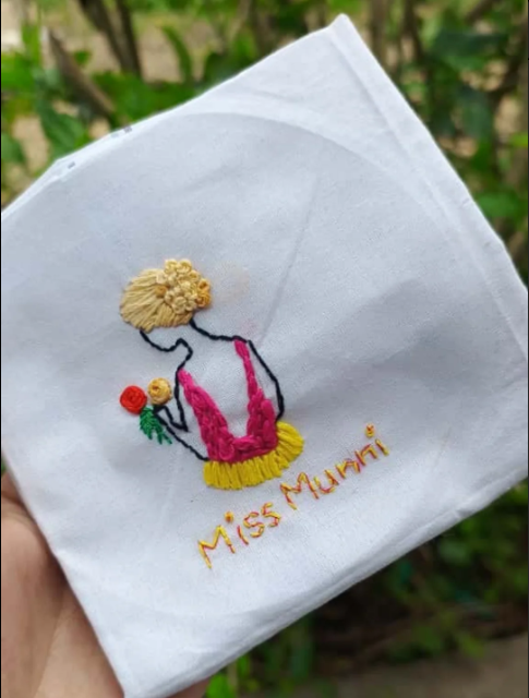 Miss Munni Tribute - Dancing figure with flowing dress and floral elements